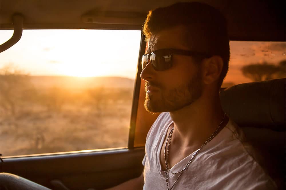 laguna shores Why Going Out of State for Addiction Treatment is a Good Thing photo of a man inside the car traveling