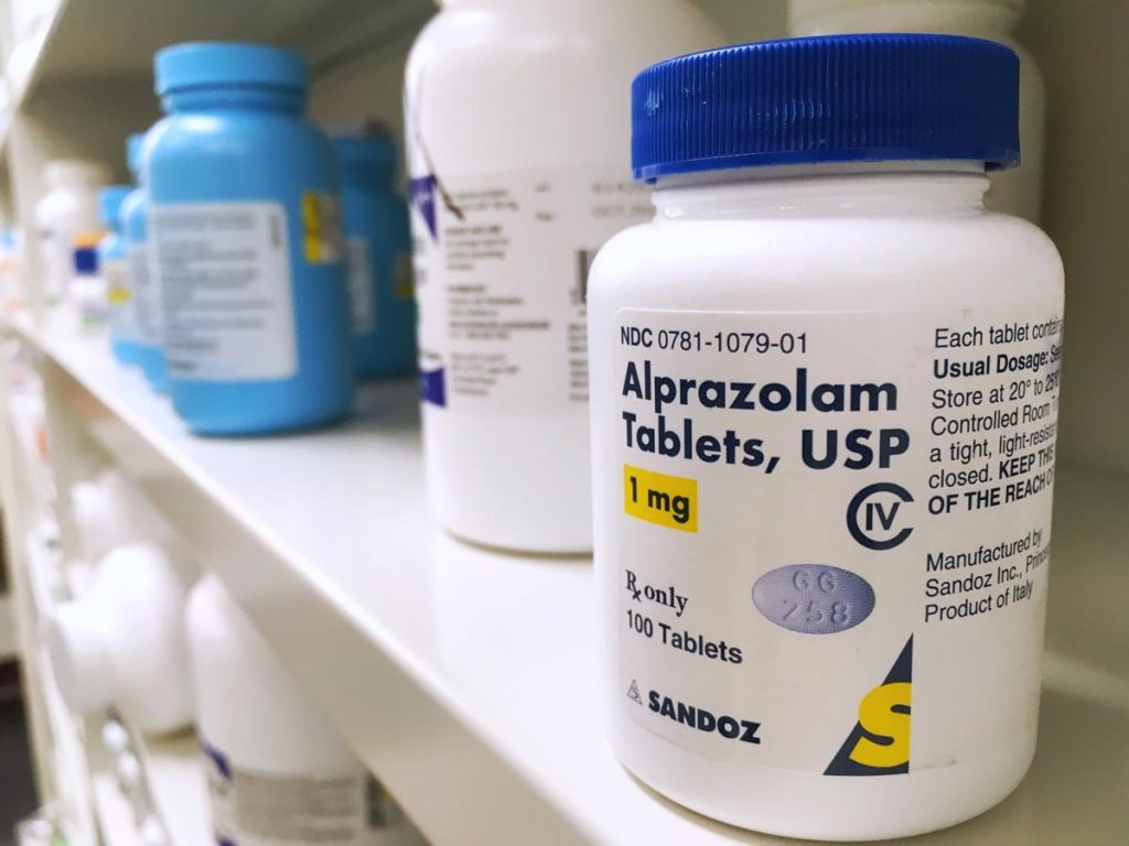 lagunashoresrecovery Common and Rare Side Effects of Xanax photo of xanax bottle on shelf which is a popular drug to abuse