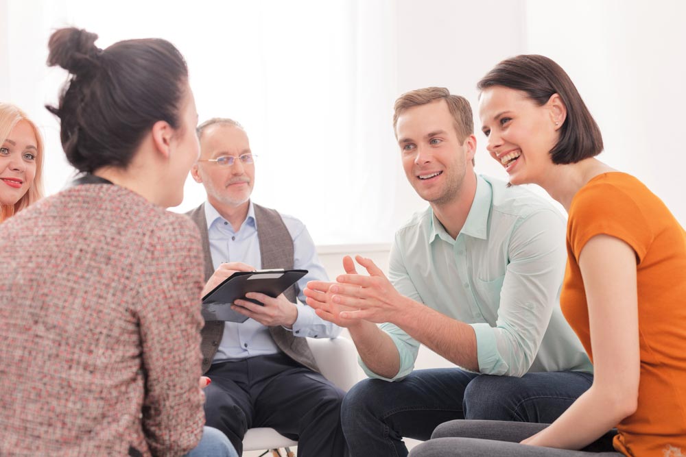 lagunashoresrecovery How to Get Insurance to Pay for Drug Rehab photo of a group therapy inside a rehab center