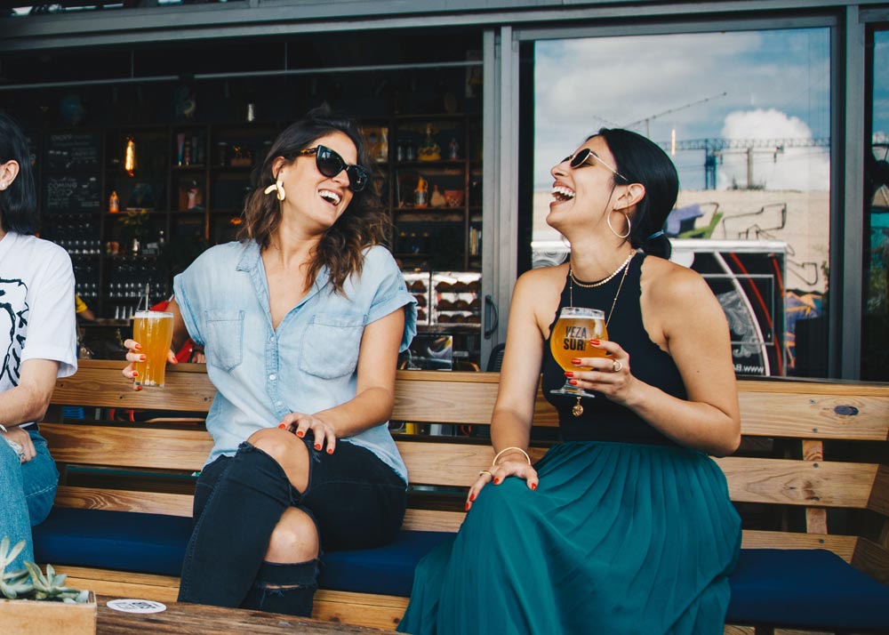 a happy woman hanging out with people who used to drink with her