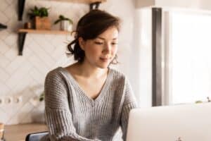 Woman looking at a laptop screen